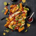 Tulinen kalapuikko-nachopelti